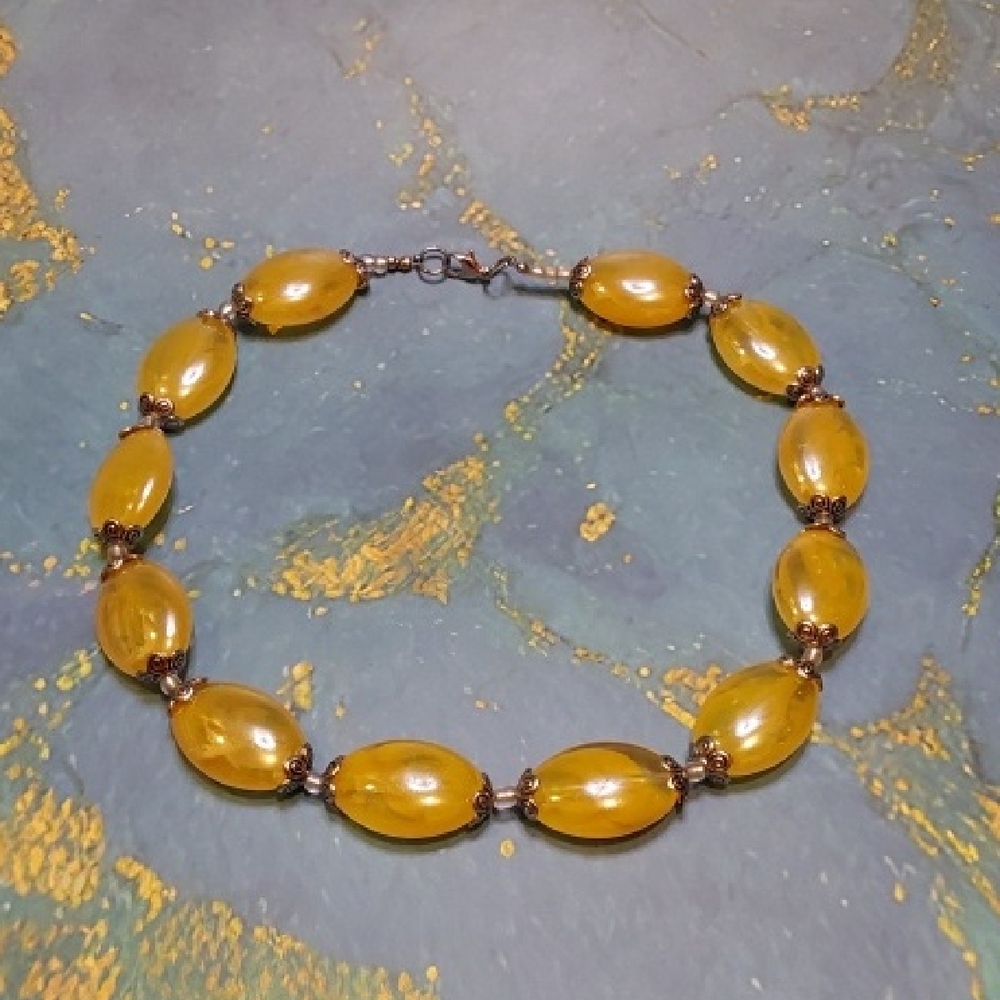 Golden Beaded Bracelet with Bronze Accents